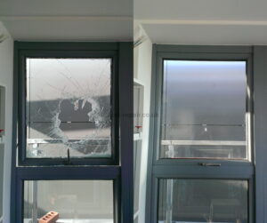 window glass smashed by brick